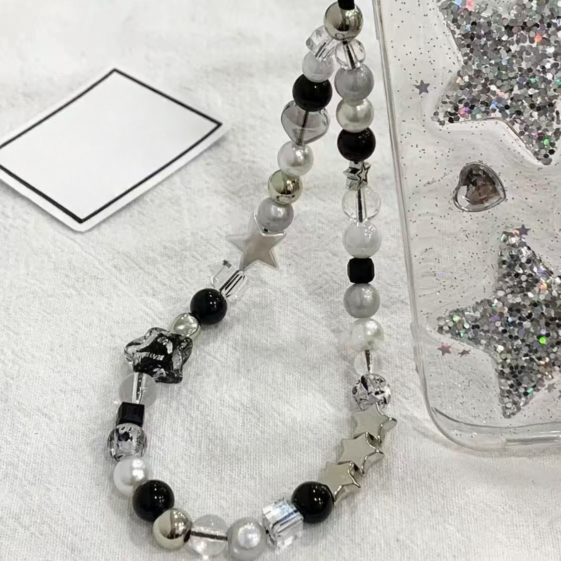 Black Silver Star Beaded Phone - Women'S Fashion Edgy recension och pris